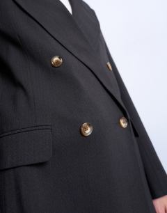 Model wearing Co ord double breasted subtle pinstripe oversized blazer in dark chocolate