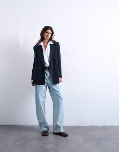 Model wearing Co ord double breasted subtle pinstripe oversized blazer in navy