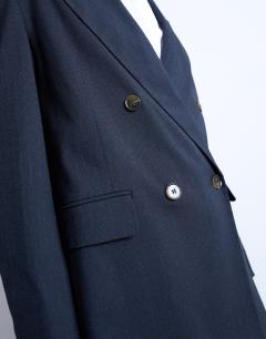 Model wearing Co ord double breasted subtle pinstripe oversized blazer in navy