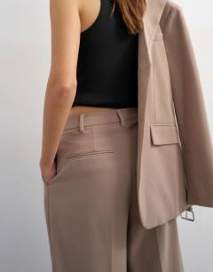 Model wearing Co ord double tailored trouser in beige 