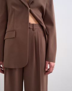 Model wearing Co ord double tailored trouser in chocolate