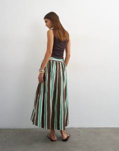 Model wearing Co-ord drop waist saloon maxi skirt in brown stripe