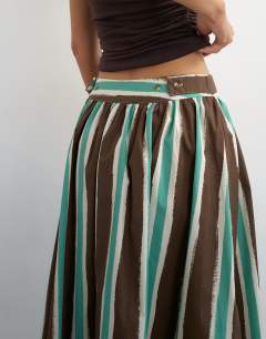 Model wearing Co-ord drop waist saloon maxi skirt in brown stripe