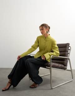 Model wearing Co ord drummer jacket in olive