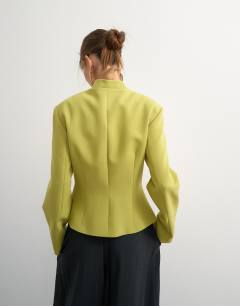 Model wearing Co ord drummer jacket in olive