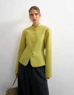 Model wearing Co ord drummer jacket in olive