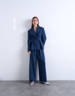 Model wearing Co ord extreme cinched waist blazer in navy