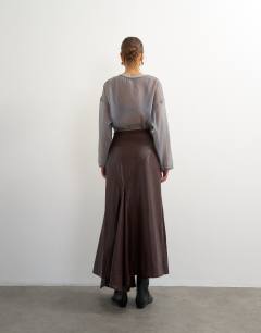 Model wearing Co-ord faux leather drape detail maxi skirt in chocolate