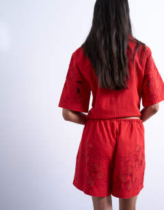 Model wearing Co ord floral applique short in red