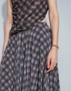 Model wearing Co-ord full circle chiffon maxi skirt in purple check print