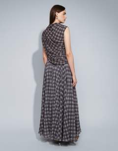 Model wearing Co-ord full circle chiffon maxi skirt in purple check print