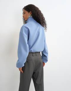 Model wearing Co ord funnel neck jacket in blue