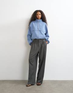 Model wearing Co ord funnel neck jacket in blue