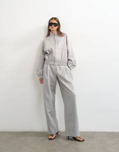 Model wearing Co ord funnel neck jacket in grey 