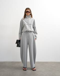 Model wearing Co ord funnel neck jacket in light grey