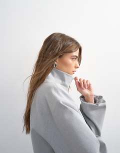 Model wearing Co ord funnel neck jacket in light grey