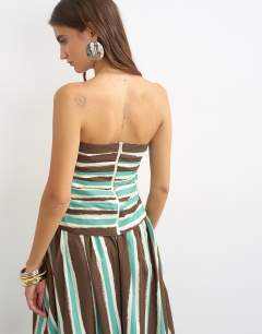 Model wearing Co-ord gathered bandeau top in brown stripe
