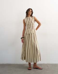 Model wearing Co-ord grown on neck pin tuck top in buttermilk stripe
