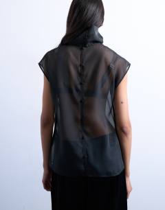 Model wearing Co-ord high neck grown on shoulder sheer organza top in black
