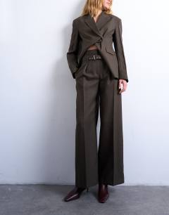Model wearing Co ord high waisted belted trouser in brown