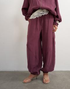 Model wearing Co ord horseshoe trouser in fig