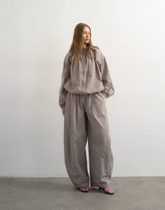 Model wearing Co ord lightweight anorak jacket in grey