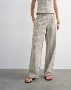 Model wearing Co ord linen look stripe low rise trouser in ecru
