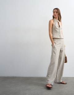 Model wearing Co ord linen look stripe low rise trouser in ecru