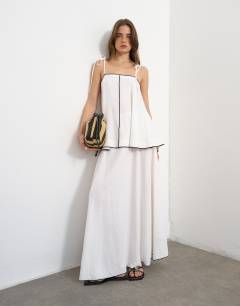 Model wearing Co-ord linen rich cami top with black contrast in off white