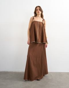 Model wearing Co-ord linen rich cami top with ecru contrast piping in brown
