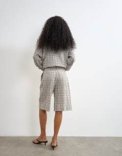 Model wearing Co ord longline bermuda short in mono check