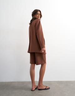 Model wearing Co ord longline short in brown