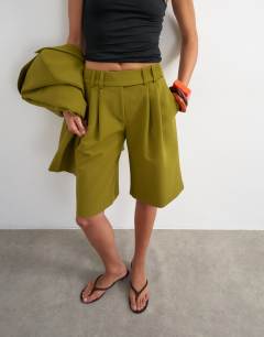 Model wearing Co ord longline short in olive