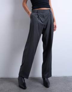 Model wearing Co ord mensy pinstripe trouser in charcoal