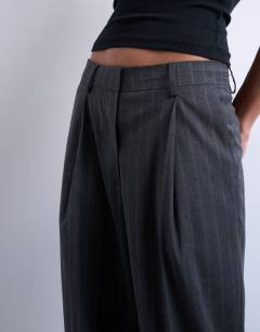 Model wearing Co ord mensy pinstripe trouser in charcoal