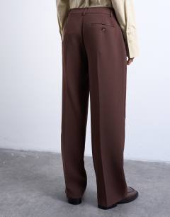 Model wearing Co ord mid rise clean straight trouser in chocolate