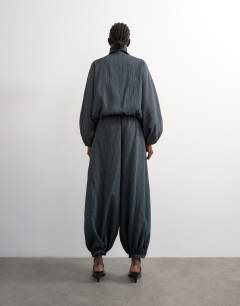 Model wearing Co ord modal stripe bubble hem trouser  in navy