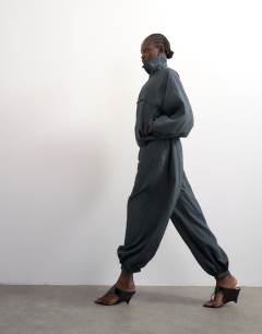 Model wearing Co ord modal stripe bubble hem trouser  in navy