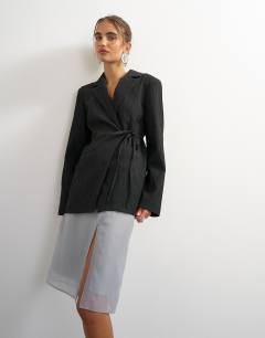 Model wearing Co ord occasion plisse tie waist blazer in black