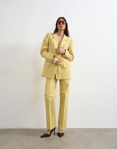 Model wearing Co ord occasion stripe clean front trouser in yellow