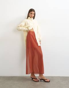 Model wearing Co-ord organza column maxi skirt in rust