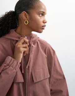 Model wearing Co-ord over the head bomber in pink