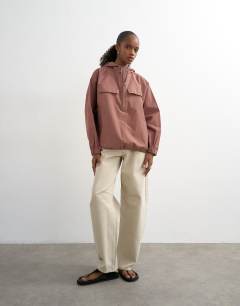 Model wearing Co-ord over the head nylon bomber in pink