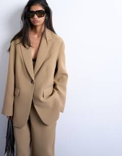 Model wearing Co ord oversized slouchy blazer in taupe