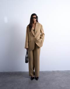 Model wearing Co ord oversized slouchy blazer in taupe