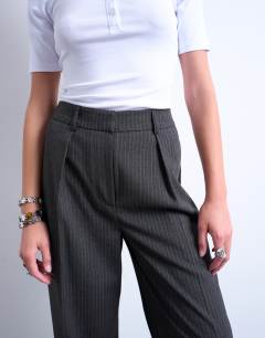 Model wearing Co ord pinstripe tailored wide leg trouser in charcoal