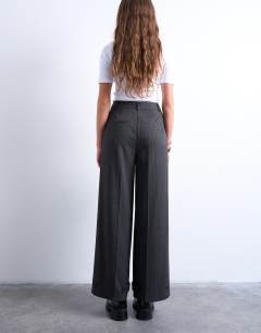 Model wearing Co ord pinstripe tailored wide leg trouser in charcoal