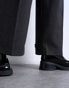 Model wearing Co ord pinstripe tailored wide leg trouser in charcoal