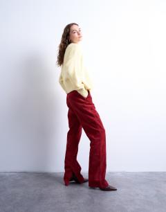 Model wearing Co ord real suede flare trousers in red