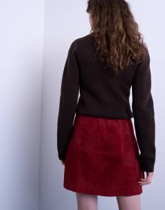 Model wearing Co-ord real suede mini skirt in burgundy
